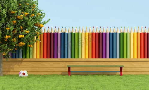 孩子彩色铅笔摄影照片_万紫千红的花园里的孩子