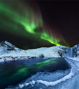 冬季筒靴摄影照片_北极极光, 冰岛冬季的北极光.