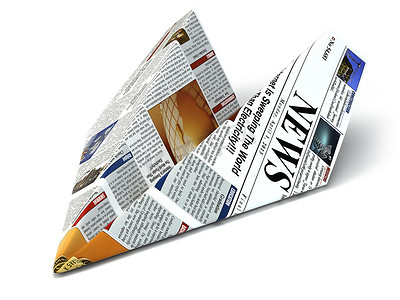 news摄影照片_额外的新闻理念。报纸作为纸飞机.