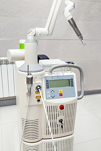 通用底纹摄影照片_在诊所内部专业通用激光医疗系统设备