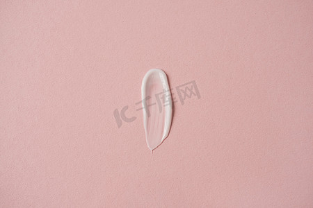 Cosmetic cream smudge setting on pink background. Aesthetic beauty cosmetic product