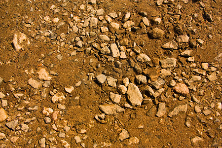 砂石背景摄影照片_砂石、 粘土和沙子