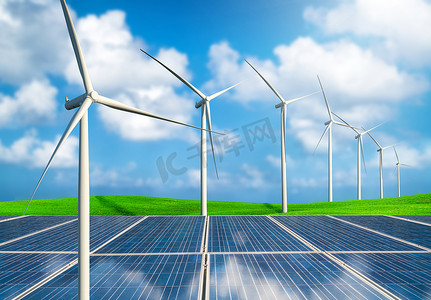 和风四面亭摄影照片_太阳能板和风力涡轮机农场在一个绿色的草地上起伏的山丘上的蓝天和白云在夏天。可再生清洁能源概念与可持续发展业务发展.