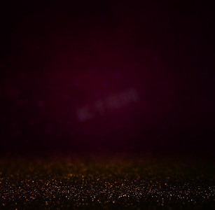 抽象的黑 bokhe 的灯光背景，紫色，黑色和微妙的黄金。离焦模糊的背景