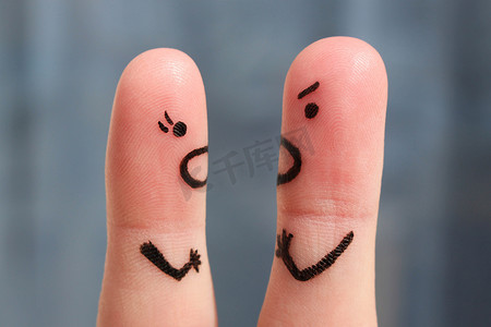 Finger art of a couple during quarrel. The concept of a man and woman yelling at each other.
