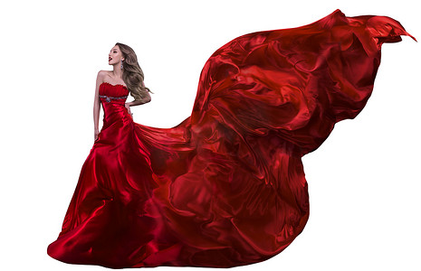 挥舞江湖摄影照片_女人时尚红色衣服，挥舞着在风上飞绸礼服 