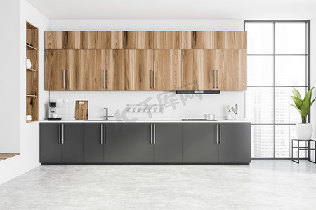灰色橱柜摄影照片_现代厨房的内部，有白色的砖墙、混凝土地面、木制橱柜和灰色橱柜。楼梯和模糊的城市景观。3d渲染