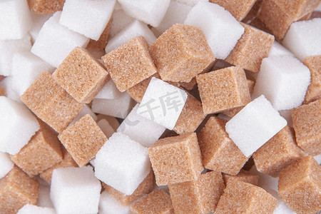 甘蔗糖和白糖立方体背景视图纹理