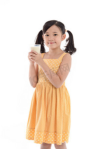 Cute asian child drinking milk 