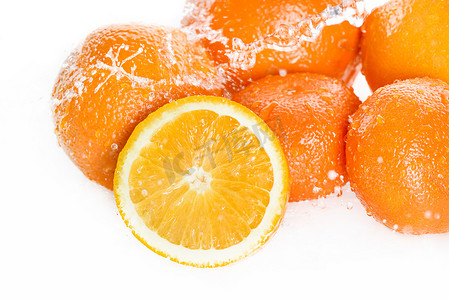橘子摄影照片_新鲜成熟的桔子 
