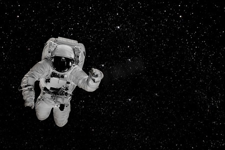 宇航员在太空摄影照片_宇航员在太空飞越地球.