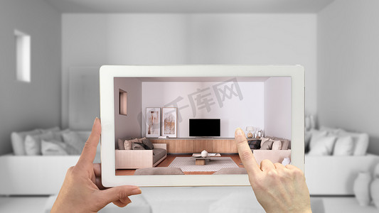 强化现实概念。 Ar-应用手持式手持式平板，用于模拟家具，并在完全白色未完成的背景下设计产品，舒适的客厅
