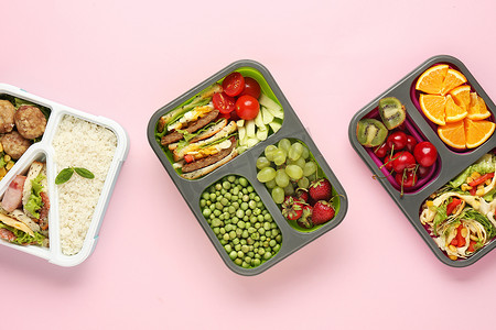 学校午餐盒，色彩背景有美味的食物