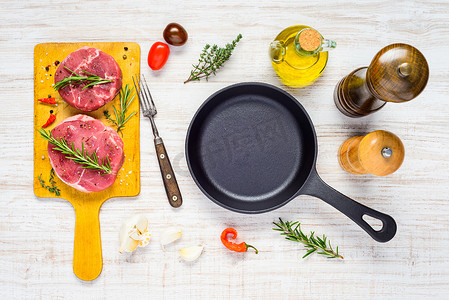 Raw Beef Meat with Frying Pan and Cooking Ingredients
