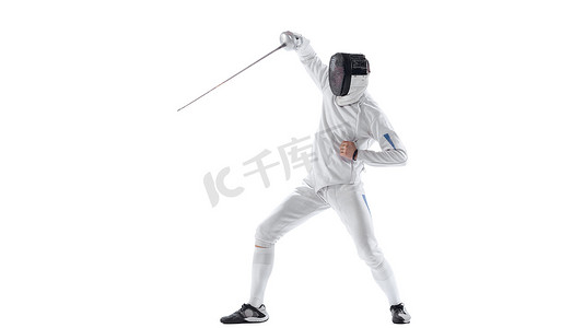 sport摄影照片_Thrust with rapier. Young man, fencer in in fencing costume with sword in hand training isolated on white background. Athlete practicing in motion, action. Copyspace for ad. Sport, energy, skills