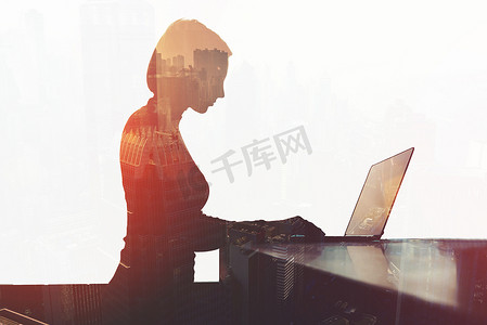 Silhouette of businesswoman working in office