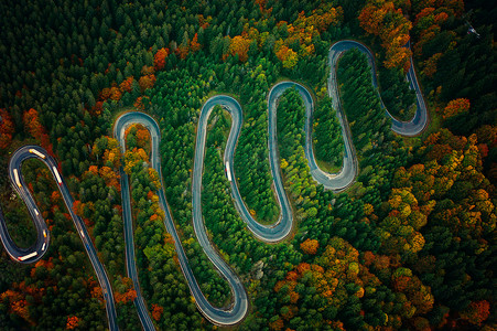 Scenic curvy road seen from a drone in autumn. Cheia, Romania. 