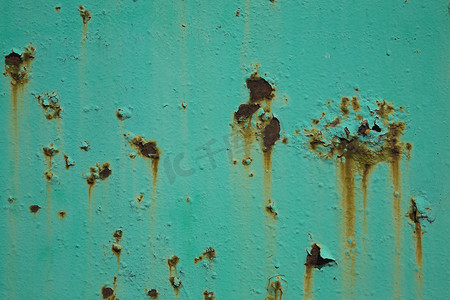 水面摄影照片_金属表面绿松石漆剥落和锈迹