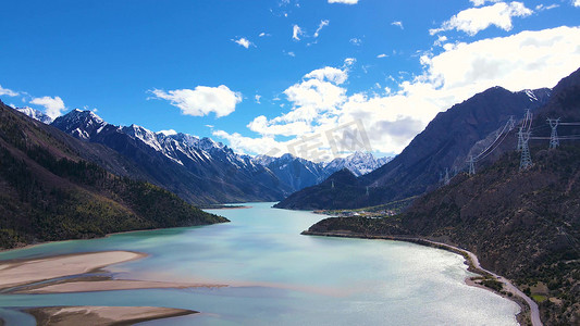 壮美摄影照片_航拍雪山下的然乌湖旅游景区