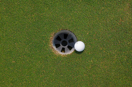 声洞摄影照片_高尔夫球和高尔夫球洞
