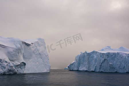 冰山背景摄影照片_格陵兰岛迪斯科湾伊卢利萨特冰湾的冰山