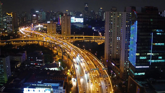 车水马龙摄影照片_上海高架楼宇穿梭