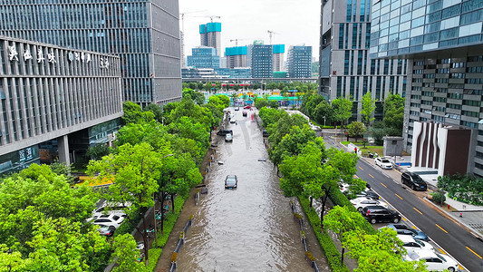 暴雨摄影照片_航拍夏季暴雨过后城市道路积水严重洪灾