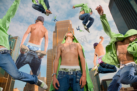 十分之三摄影照片_十几岁的男孩在城市跳跃