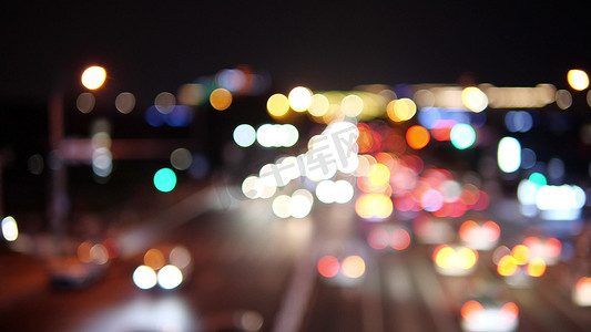 夜景虚化摄影照片_城市街道夜景车流虚化朦胧灯光光点