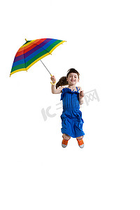 少女撑着雨伞摄影照片_一个撑着伞跳的女孩