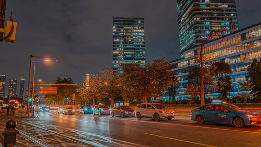 报刊摄影照片_城市夜景广州日报城市地标交通