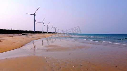 环保宣传册设计摄影照片_文昌市木兰湾风车和海岸风光