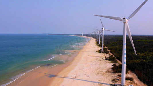 环保宣传册设计摄影照片_文昌市木兰湾风车风力发电