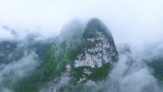 山水缭绕摄影照片_航拍广西云雾缭绕喀斯特风光祖国山河风光