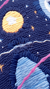 星空图案背景图片_儿童卡通毛线编织星空星球图案背景