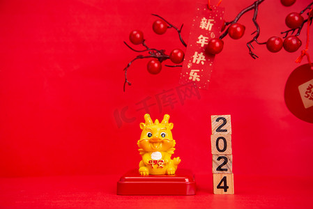 红金色背景摄影照片_春节2024金色龙摆件背景摆放摄影图配图