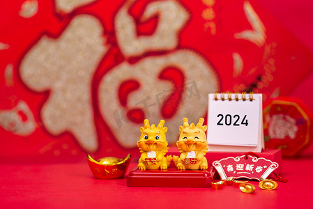 新年春节2024红色背景摆放摄影图配图