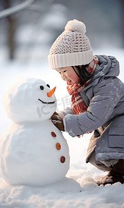 冬天小孩雪地里堆雪人摄影图7