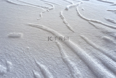 冬天白色雪花背景图片_冬天白色积雪雪地背景