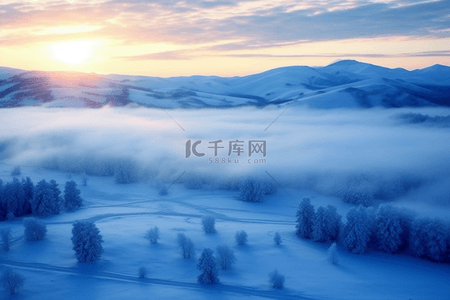 日出雪景唯美背景摄影图冬天