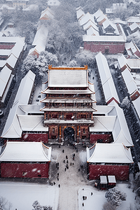 冬天雪景天空背景图片_冬天雪景摄影图建筑俯视背景