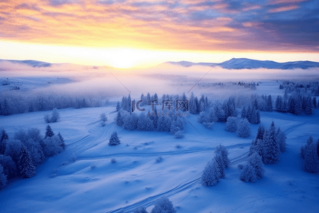 俯视背景图背景图片_冬天日出雪景唯美背景摄影图