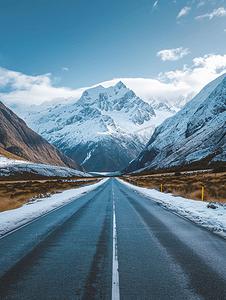 风景马路摄影照片_雪山下的公路新西兰自驾风光