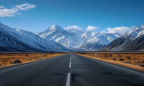 风景马路摄影照片_雪山下的公路新西兰自驾风光