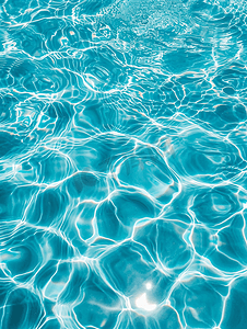蓝色背景光点摄影照片_夏天游泳池蓝色水波纹