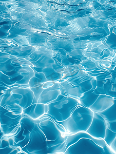 游泳背景摄影照片_夏天游泳池蓝色水波纹