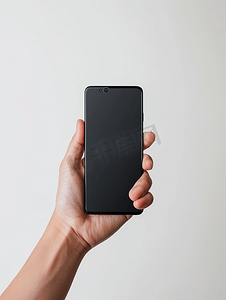 手机黑色苹果手机摄影照片_样机手持黑色智能手机