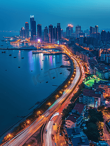 夜景背景摄影照片_青岛现代城市风景海岸线