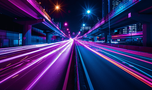公路夜景摄影照片_公路在城市景观霓虹灯光