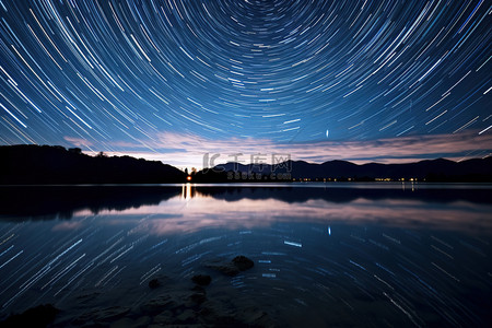 湖泊素材背景图片_湖泊夜空星迹延时背景素材